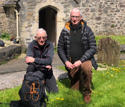 Best foot forward: Cyril Phillips and Revd Matt Webster are leading a 70 mile pilgrimage from St Peter’s Church, Carmarthen to St Davids Cathedral in Pembrokeshire.